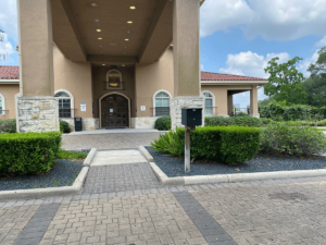 a photo of the front of a houston tx addiction treatment center that offers a music therapy treatment program